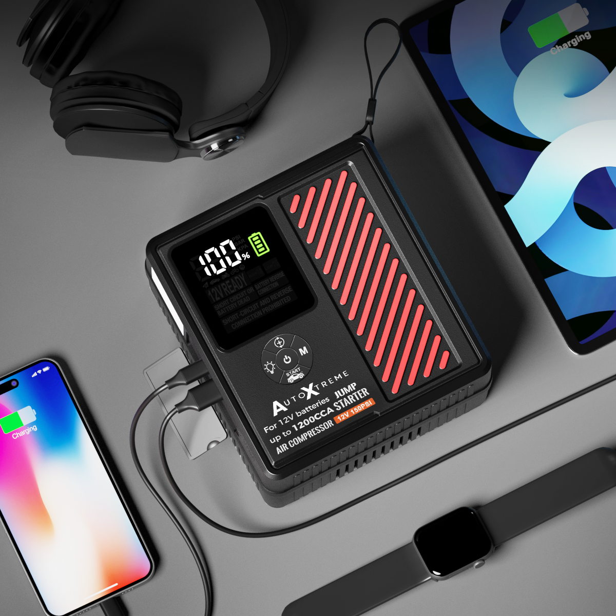 Boost Air Plus als powerbank, laadt een telefoon en een tablet op via USB
